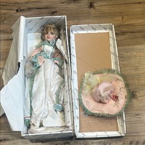 Golden Keepsakes “Anastasia” Elegant Porcelain Doll with Pink and Green Dress
